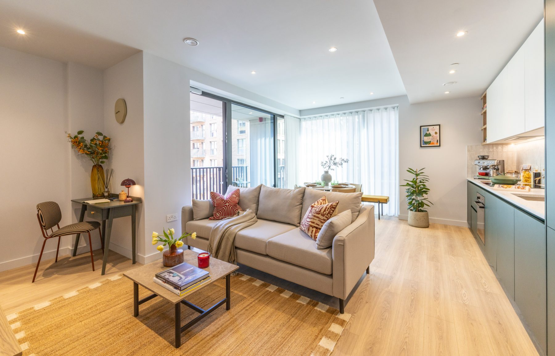A bright apartment living room at The Maple